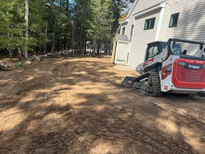 Our Skid Steer Work service efficiently handles landscaping, grading, and debris removal for homeowners, ensuring precise earthmoving and a clean finish to transform your property with professional expertise and reliable machinery. for M.J. Merrill & Sons Excavation in Manchester, NH