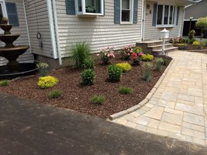Our Mulch Installation service offers homeowners a hassle-free way to improve the health and aesthetics of their landscape by professionally applying mulch around trees, plants, and garden beds. for Sam's Tree Service in Miami Beach,  FL