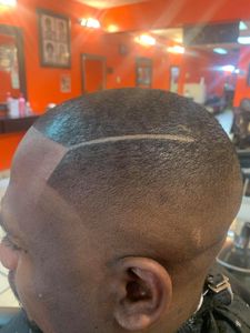 Our Haircuts service provides stylish and professional haircuts by experienced barbers and stylists in a welcoming atmosphere. for Pascy Hair Braiding Salon & Barber Shop in Baltimore, MD