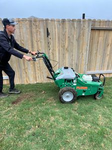 Our lawn aeration service promotes healthy turf by perforating the soil with small holes, allowing air, water, and nutrients to penetrate deep into the roots for lush and vibrant grass. for Alamo Turf Works in San Antonio, TX