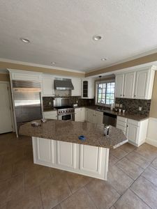Our kitchen and cabinet refinishing service revitalizes your space with expert craftsmanship, transforming old surfaces into stunning, like-new finishes while adding value and beauty to your home efficiently. for Ivan L Paints in Knoxville, TN