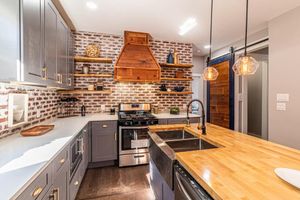 Our Kitchen and Cabinet Refinishing service offers homeowners a cost-effective solution to transform their outdated kitchen cabinets into a fresh, modern look without the need for a complete renovation. for L.P. Contractors in San Antonio, Texas