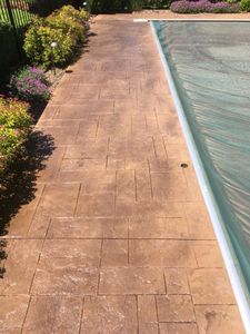 Our stamped concrete service can add value and beauty to your home. We have a wide variety of stamps and colors to choose from, so you can create a unique look that's perfect for your home. for Country Concrete in Monee, IL