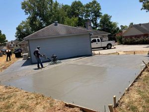 Our Concrete Services offer top-quality and efficient solutions for all your concrete needs, from patios to driveways, ensuring a beautiful and durable addition to your outdoor living space. for Guzman's Landscaping Services in Austin, TX
