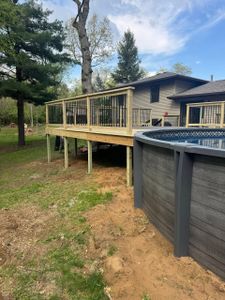 Enhance your outdoor living space with our expert deck & patio installation services, offering customized designs and durable construction to transform your backyard into a functional and beautiful retreat. for Risner Construction in De Motte, IN