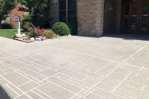 Our Stamped Concrete Installation service offers homeowners the option to enhance their outdoor spaces with custom-designed concrete surfaces that mimic the look of various materials like brick, stone, or tile. for Top Tier Concrete & Lawn Services in Broken Arrow, Oklahoma