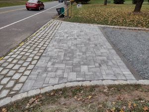 Our Brick Pavers service offers homeowners high-quality and durable materials for creating beautiful pathways, patios, and driveways on their property. for PM Masonry in Manville, NJ