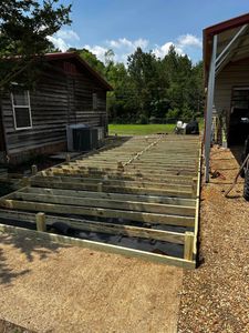 Our Deck & Patio Installation service offers professional assistance to homeowners looking to enhance their outdoor living spaces with custom and high-quality decks or patios. for Simmons Construction in Starkville, MS