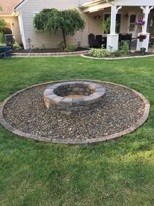 Our Walls & Firepits service offers homeowners the perfect solution to add both functional and aesthetic value to their outdoor space with beautifully designed and durable concrete walls and fire pits. for Doncrete LLC in Medina, OH