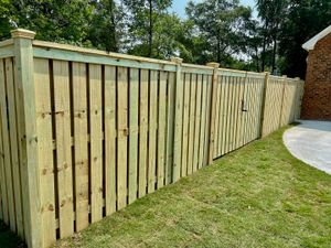 Our Wood Privacy service offers homeowners the opportunity to enhance their outdoor space by installing high-quality wooden fences that provide privacy and a beautiful aesthetic appeal. for 4 In The Fire Fencing LLC in Darlington, SC