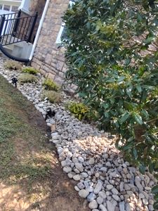 Our Rock Services enhance your garden by integrating rock features for style and functionality, complementing our other lawn services to create a beautifully balanced and well-maintained outdoor space. for Noel Velazquez Landscaping  in Williamsburg, VA