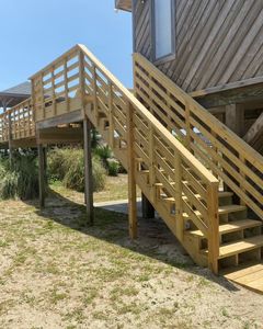 Our Decks and Wood Structures service provides homeowners with beautiful, long-lasting decks and other wood structures. We use the highest quality materials and construction techniques to ensure your new deck or structure is safe, sturdy, and looks great for years to come. for A1 Roofing in Supply, NC