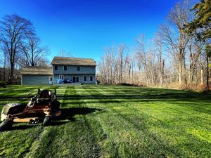 We offer professional mowing services for your lawn, ensuring a neat and even cut with every visit. for Hennessey Landscaping LLC in Oxford,  CT 