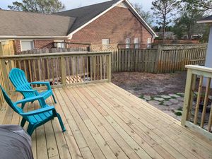 Enhance your outdoor living space with our expert deck & patio installation services, transforming your backyard into a beautiful retreat, perfect for entertaining or relaxing in comfort and style. for Albatross Construction in Wilmington, NC
