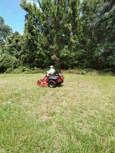 Our professional mowing service offers meticulous lawn care, ensuring a well-manicured appearance while promoting healthy grass growth. Enjoy consistent quality and attention to detail that enhances the beauty of your outdoor space. for Ludlows Services in Davenport, FL