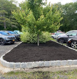 Mulch installation is a great way to add color and texture to your landscape. Mulch can also help protect your plants from the elements and reduce erosion. for Cuellar Lawn Care in Highland , NY 