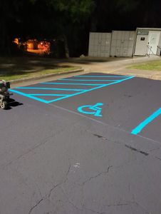 Our professional line striping service adds aesthetic appeal and organization to your driveway or garage, enhancing safety and curb appeal while showcasing attention to detail in our workmanship. for Burning it Concrete LLC in Raleigh, NC