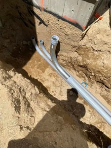 Our Underground Utility Excavation service safely and efficiently locates and excavates buried utilities, ensuring minimal disruption to your property while protecting vital connections like water lines, gas pipes, and electrical conduits. for M.J. Merrill & Sons Excavation in Manchester, NH