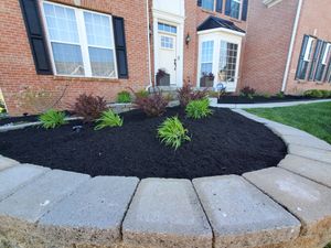 Mulch is used to help maintain the health of your landscape and adds a professional touch to any planter. It can be placed over soil to lock in moisture and improve soil conditions to encourage a healthier lawn. We provide a variety of professional mulching services. for Tingley's Green Land Services in Springfield, Ohio