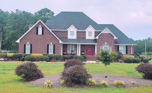 Our Roof Cleaning service is a safe and effective way to clean your roof. We use a low-pressure system and special detergents to remove dirt, moss, and algae from your roof. This will help extend the life of your roof and improve its appearance. for Bullards Pressure Washing Services in Pembroke, NC