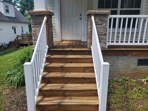 Our professional staining service is designed to enhance the aesthetic appeal of your home by providing a long-lasting finish to surfaces such as decks, fences, and patios. for High Definition Pressure Washing in Asheville, NC