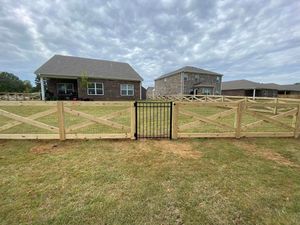 We offer custom wooden fences to suit the specific needs of each homeowner. Choose from a variety of design styles and materials for a beautiful, secure fence that will last for years. for Manning Fence, LLC in Hernando, MS