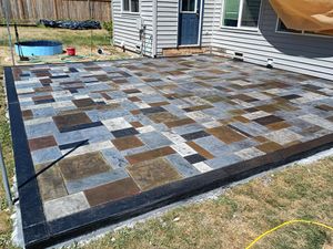 Our Stamped Concrete Installation service offers homeowners a durable and visually appealing solution to enhance their driveways, patios, or walkways with the look of high-end materials at an affordable price. for All Mighty Concrete LLC in Bremerton, WA