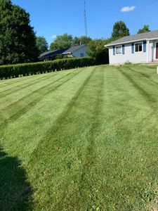 Our mowing service ensures a pristine lawn, with precise cutting, timely scheduling, and professional care. Enhance your home's curb appeal effortlessly while maintaining a healthy and beautiful outdoor space year-round. for R and R Landcare in Birch Run, MI