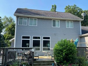 Our Home Softwash service gently cleans your home's exterior with a low-pressure detergent solution, removing built-up dirt, grime, and mildew without damaging your paint or siding. for A&E Pressure Washing & Roof Cleaning LLC in Owosso, MI