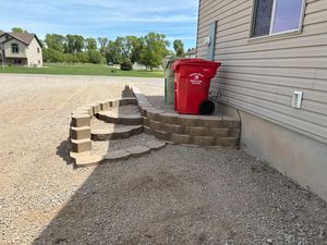 Our expert retaining wall construction service enhances your landscape by providing stability, preventing soil erosion, and adding aesthetic appeal to your property. Trust our skilled team for durable and beautiful results. for Falls Property Services  in Idaho Falls, ID