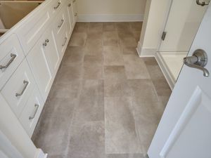 Transform your home with our premium tile flooring service, offering a versatile and durable alternative to wood flooring. experience long-lasting elegance and easy maintenance tailored to enhance any living space. for Brooks Flooring in Burlington, NC