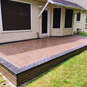 Transform your outdoor space with our professional patio design & construction service. Our skilled team will create a stunning paver patio tailored to enhance your home and lifestyle, adding value and beauty. for Guzman's Landscaping Services in Austin, TX