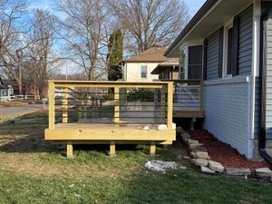 Our Deck & Patio Installation service offers homeowners professional and expertly crafted outdoor spaces, designed to enhance your home's beauty and provide a perfect space for relaxation and entertaining. for Midwest Remodel in Des Moines,  IA