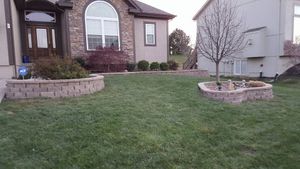 Enhance your outdoor space with our expert retaining wall construction service, designed to prevent soil erosion, maximize usability, and add aesthetic appeal to any garden or yard. Durable and beautifully crafted solutions await. for Curb Appeal Lawn Care in Kansas City, Kansas