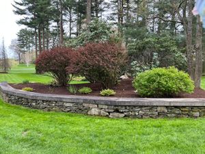 Enhance your outdoor space with our Retaining Wall Construction service, expertly crafted to protect against erosion, optimize land use, and add aesthetic appeal to your landscape's design. for Jose & Sons Landscaping in New Bedford, MA