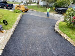 We provide professional asphalt paving services to give your home a long-lasting, smooth and attractive driveway or other paved surface. for MAN Enterprises Inc. in Baltimore, MD