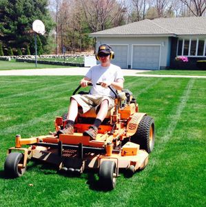 Our Mowing service provides quality and efficient lawn maintenance to ensure your property looks pristine all season long. Trust our experienced team for a hassle-free experience. for RI Outdoor Living  in Charlestown, Rhode Island