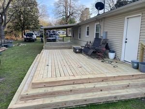 Our Deck & Patio Installation service offers professional construction and remodeling solutions to enhance your outdoor living space and create a beautiful, functional area for relaxation and entertainment. for MD Contractors and Construction LLC in Henryetta, Oklahoma