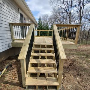 We offer professional deck and patio installation services to help you create a beautiful outdoor living space to enjoy with family and friends. for Dead Tree General Contracting in Carbondale, Illinois
