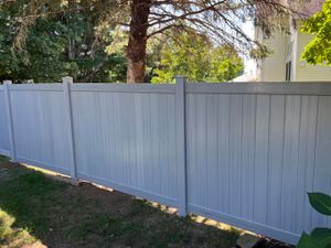 Our Vinyl Fences service provides high quality, durable fencing solutions to enhance your home's security and aesthetic appeal. for Illinois Fence & outdoor co. in Kewanee, Illinois