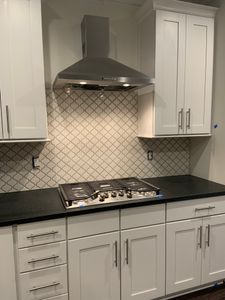 Our Kitchen Remodels service offers homeowners the opportunity to transform their kitchen spaces, creating functional and aesthetically pleasing areas for cooking, dining, and entertaining guests. for Premier Tile Contractors LLC in Henrico, Virginia