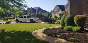 Our Mulch Installation service offers professional and efficient placement of premium quality mulch on your property, enhancing the appearance of your landscape while also improving soil health and reducing weed growth. for Andres Landscaping, LLC in Decatur, AL