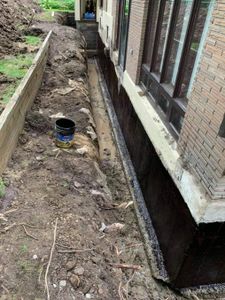 Ensure your home's stability with JCM Paving & Masonry's foundation waterproofing services, protecting against moisture and preventing structural damage for long-lasting durability and peace of mind. for  JCM Paving and Masonry Inc in Waltham, NH