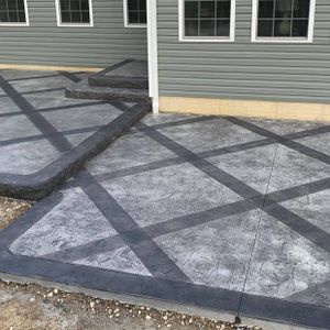 Our Stamped Concrete Installation service offers homeowners a durable and aesthetically pleasing solution for enhancing their outdoor spaces with customizable patterns and textures. for CK Concrete in Lorain, OH