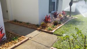 Enhance your outdoor space with our expert irrigation system design and install service, ensuring lush landscapes while perfectly complementing your garden's beauty through seamless stone veneer installation. for Ludlows Services in Davenport, FL