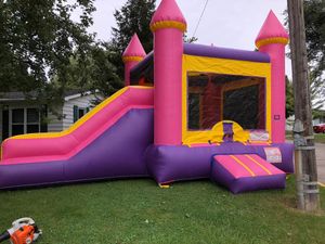 "experience the ultimate fun and excitement for your next party with our Bouncy Houses service, providing hours of jumping entertainment that will surely delight both kids and adults. for Adams County Bounce Houses, LLC in Decatur, IN