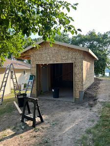 Enhance your home's functionality and value with our expert garage construction services. We offer customized designs, quality craftsmanship, and efficient builds tailored to meet your specific needs and preferences. for Pro Install LLC in Stacy, MN