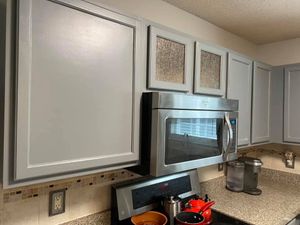 Kitchen and Cabinet Refinishing is a service we offer to refinish your cabinets to make them look brand new. We will sand down your cabinets, patch any holes or dings, and then paint them with a color of your choice. for Award Painting in Fayetteville, NC