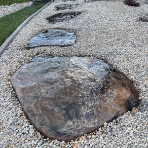 Our Custom Stepping Stones and Walkways service can help give your home's outdoor space the perfect look - create inviting paths, accents, and more. for Streamline Borders in Indian trail, NC