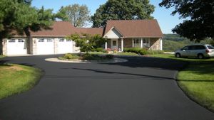 Our Sealcoat Installation service protects and enhances the appearance of your driveway, extending its lifespan by sealing cracks and providing a smooth, durable surface. for Pacific Sealcoating in Bend, OR